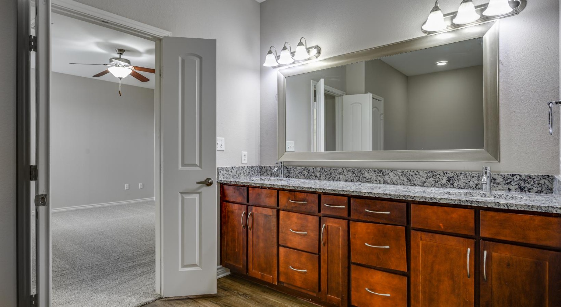 a bathroom with a large mirror